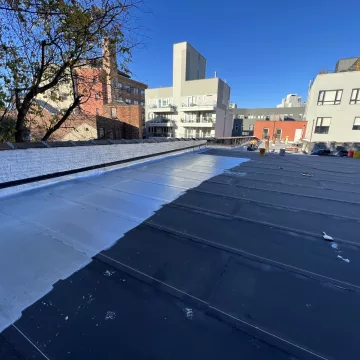 The_incomplete_roofing_reveals_the_framework_beneath,_highlighting_the_work_still_left_to_be_done_by_The_Premium_Roofing_in_Brooklyn_New_York