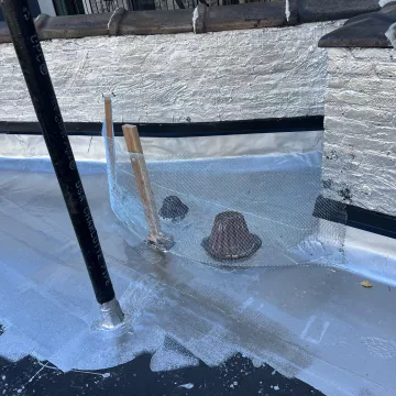 The_intricate_details_of_the_roofing_tiles_are_captured_in_this_close_up_shot_roofing_done_by_The_Premium_Roofing_in_Brooklyn_New_York