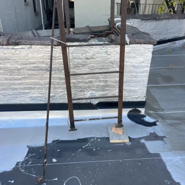 The_newly_installed_roof_adds_a_fresh_and_polished_touch_to_the_house_by_The_Premium_Roofing_in_Brooklyn_New_York